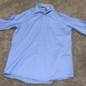 Van Heusen dress shirt. Color. Dark baby blue